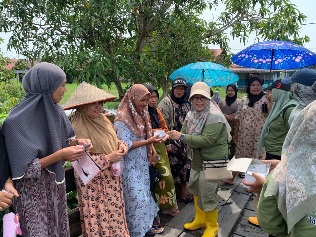 DPPKBP3A Bersama Puspaga Ije Jela Batola Gelar Kegiatan Trauma Healing dan Pelayanan KB di Desa Antasan Segara